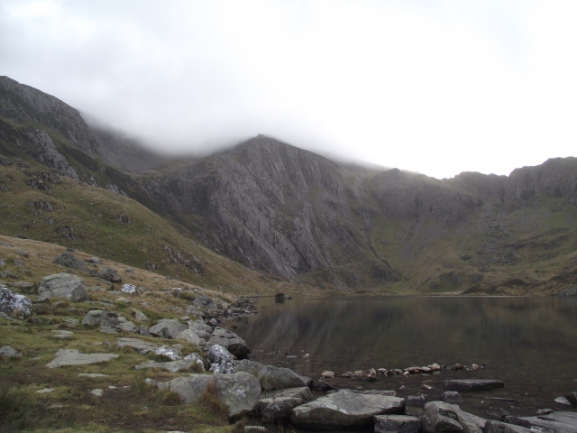 The lake of Llyn Idwal, with Idwal Slabs centre and Seniors Ridge running above the top left of the slabs
